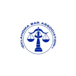 "Official logo of the Oklahoma Bar Association featuring balanced scales of justice.".